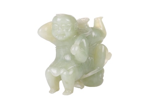 Lot 57 - A large Chinese green jade carving of two...