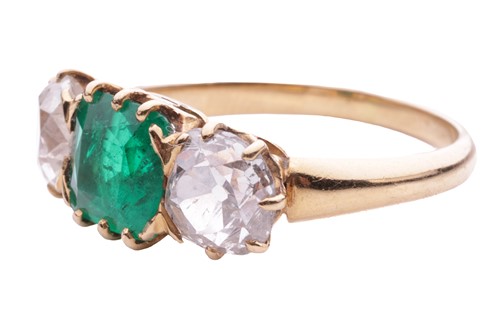 Lot 152 - An emerald and diamond three stone ring, the...