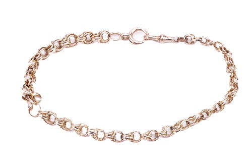 Lot 84 - A fancy link watch fob chain, the links in a...