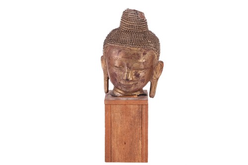 Lot 34 - A Burmese gilt lacquered composition head of...
