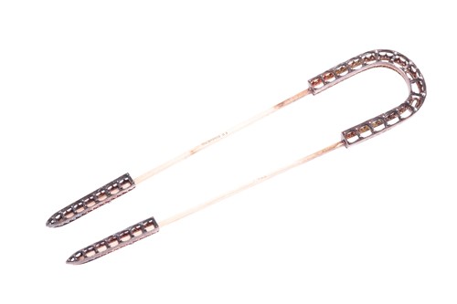 Lot 93 - A French hair pin, by Boucheron. Set with...