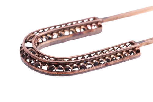Lot 93 - A French hair pin, by Boucheron. Set with...