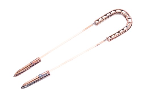 Lot 93 - A French hair pin, by Boucheron. Set with...