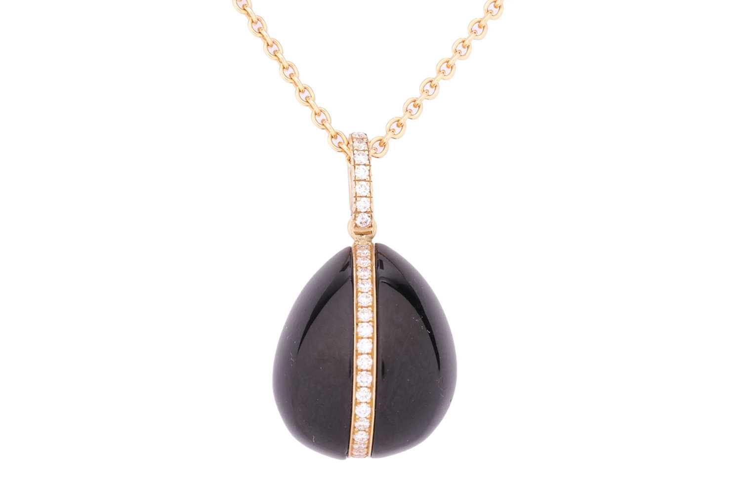 Lot 97 - A Fabergé Whitby jet egg pendant, the cabochon...