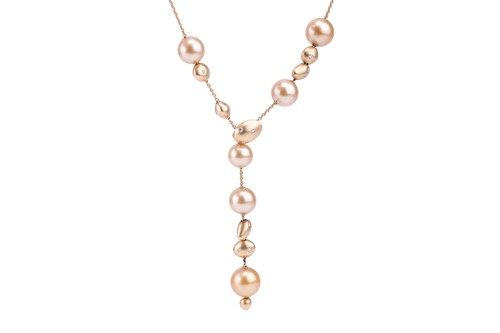 Lot 102 - An unworn Mikimoto Gold South Sea cultured...