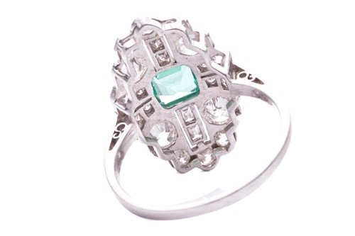 Lot 202 - An Art Deco emerald and diamond plaque ring,...
