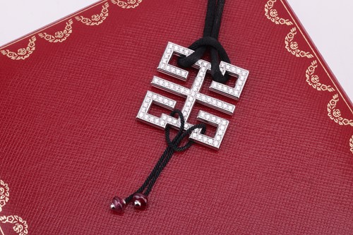 Lot 97 - Cartier - a diamond-set 'Le Baiser du Dragon...