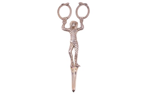 Lot 304 - A Victorian cast and silver gilt "Harlequin"...