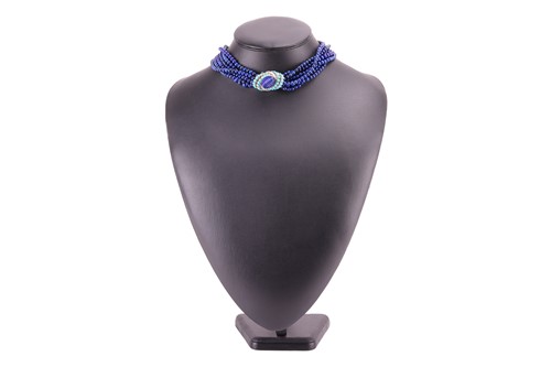 Lot 205 - Cartier - a torsade necklace and a single...