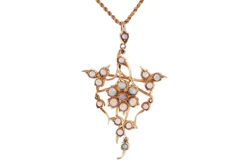 Lot 60 - An opal-set floral brooch cum pendant on chain,...