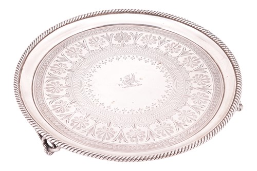 Lot 260 - A Victorian silver salver; circular with...