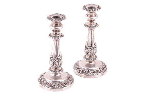 Lot 301 - A pair of George IV silver candlesticks, by S...