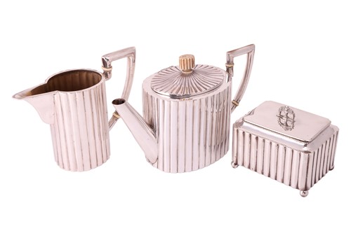 Lot 319 - An Art Deco three-piece tea service,...