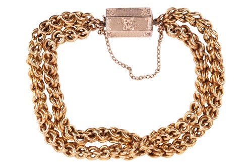 Lot 76 - A double-row fancy link bracelet with a...