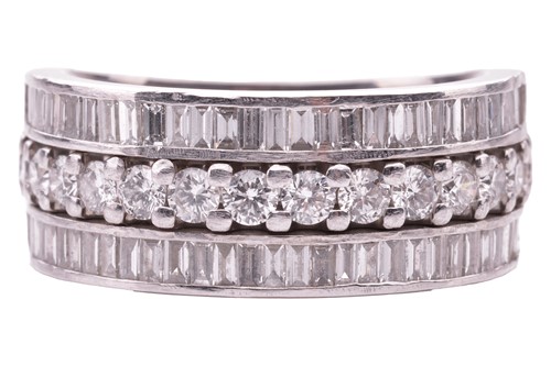Lot 60 - A three-row diamond dress ring in platinum,...