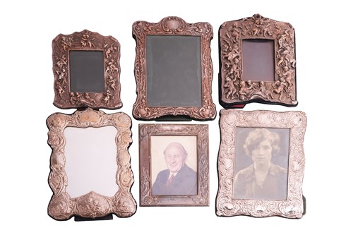 Lot 320 - Six decorative silver and white metal fronted...