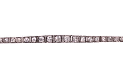 Lot 200 - An Art Deco diamond line bracelet circa 1920s,...