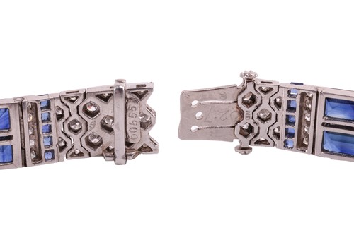 Lot 204 - An Art Deco sapphire and diamond line bracelet...