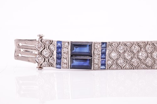 Lot 204 - An Art Deco sapphire and diamond line bracelet...