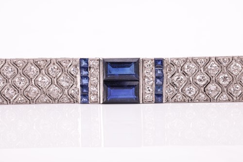 Lot 204 - An Art Deco sapphire and diamond line bracelet...