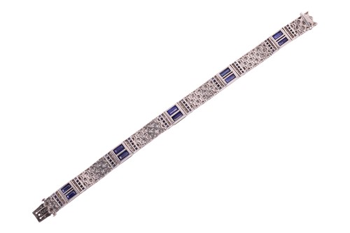 Lot 204 - An Art Deco sapphire and diamond line bracelet...