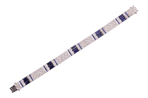 Lot 204 - An Art Deco sapphire and diamond line bracelet...