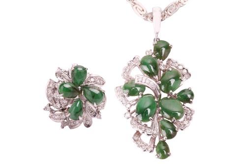 Lot 109 - A jadeite and diamond cluster pendant and...