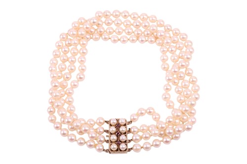 Lot 9 - A four-strand pearl choker necklace, the...