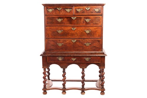 Lot 111 - A 17th-century and later figured walnut chest...
