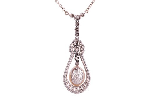Lot 1 - A natural saltwater pearl and diamond lavalier...