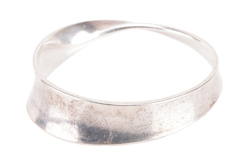 Lot 143 - Georg Jensen - a 'Möbius' closed bangle,...