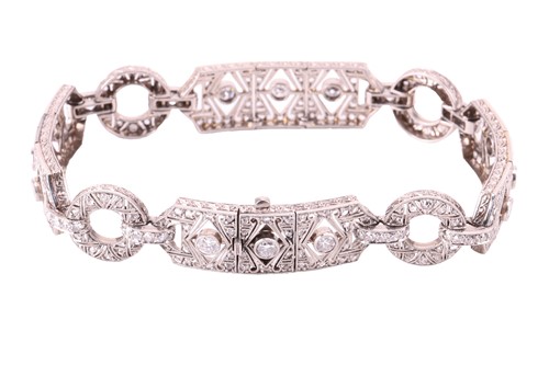 Lot 97 - An Art Deco diamond bracelet, set throughout...