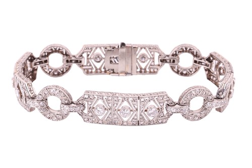 Lot 97 - An Art Deco diamond bracelet, set throughout...
