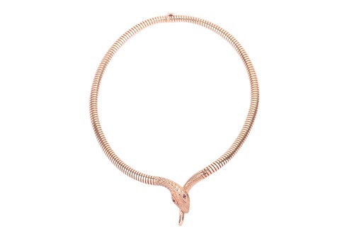 Lot 133 - A serpent necklace in 9ct yellow gold, with an...
