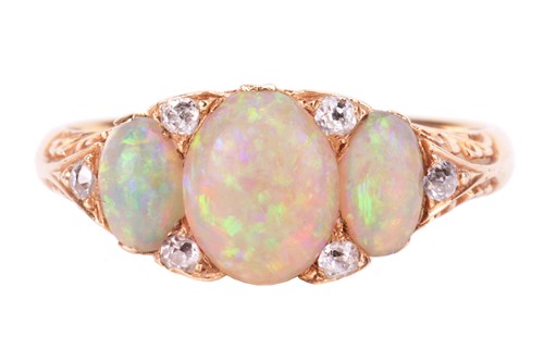 Lot 25 - An opal and diamond half-hoop ring, featuring...