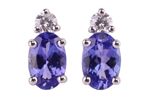 Lot 84 - A pair of tanzanite and diamond earrings, the...