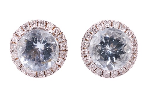 Lot 118 - A pair of aquamarine and diamond halo earrings,...