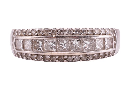 Lot 82 - A diamond-set ring, featuring nine...