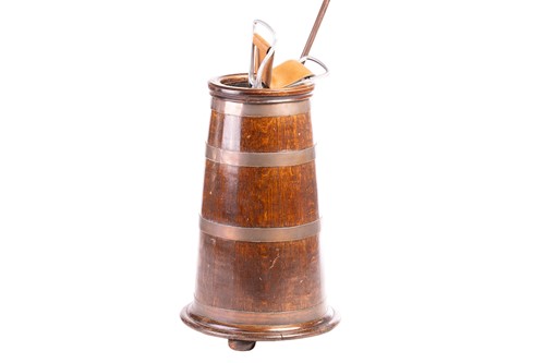 Lot 100 - A 19th-century coopered oak stick stand of...