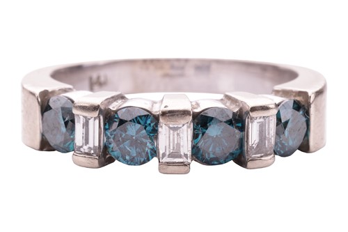 Lot 125 - A seven-stone diamond half hoop ring, the...