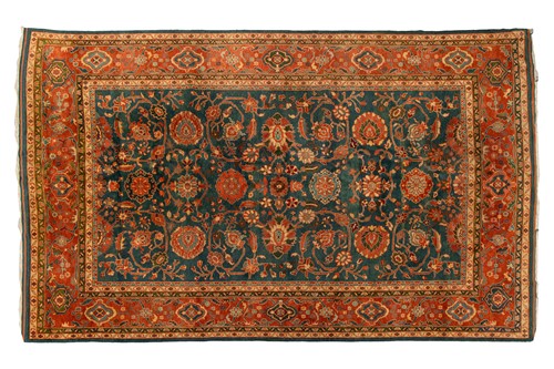 Lot 126 - A large Ushak Carpet, the red palmette and...