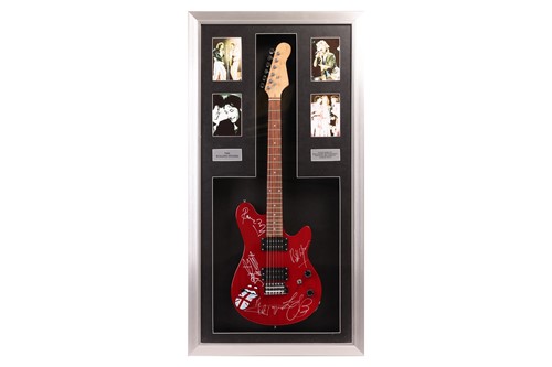 Lot 163 - The Rolling Stones: an electric guitar signed...