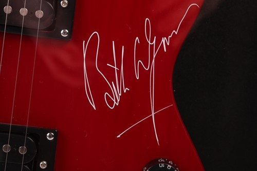 Lot 163 - The Rolling Stones: an electric guitar signed...