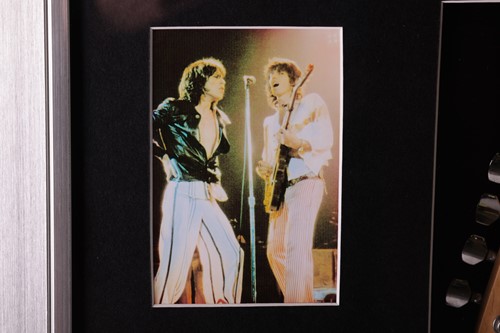 Lot 163 - The Rolling Stones: an electric guitar signed...