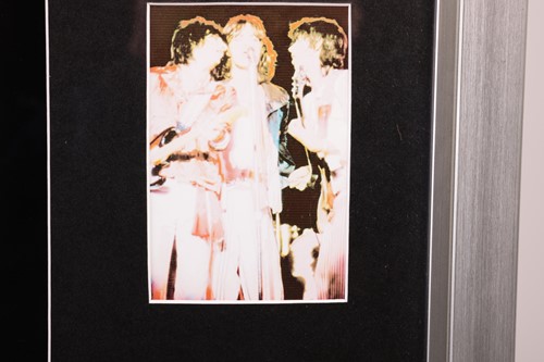 Lot 163 - The Rolling Stones: an electric guitar signed...