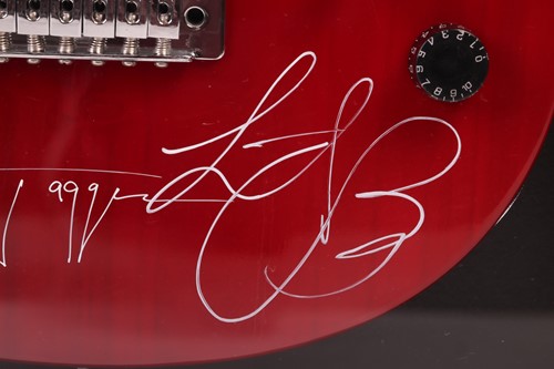 Lot 163 - The Rolling Stones: an electric guitar signed...
