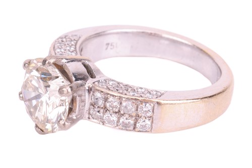 Lot 106 - A diamond solitaire ring with diamond set...