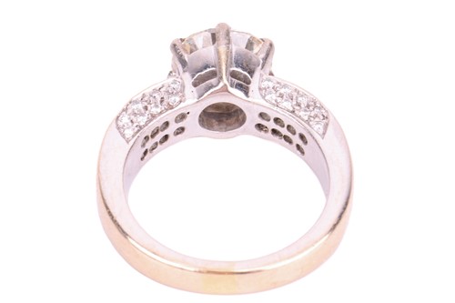 Lot 106 - A diamond solitaire ring with diamond set...