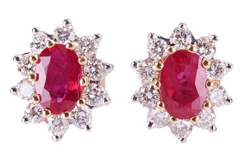 Lot 60 - A pair of ruby and diamond cluster earrings,...