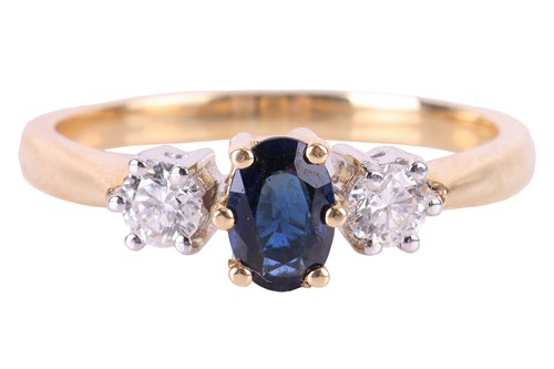 Lot 149 - A sapphire and diamond trilogy ring in 18ct...